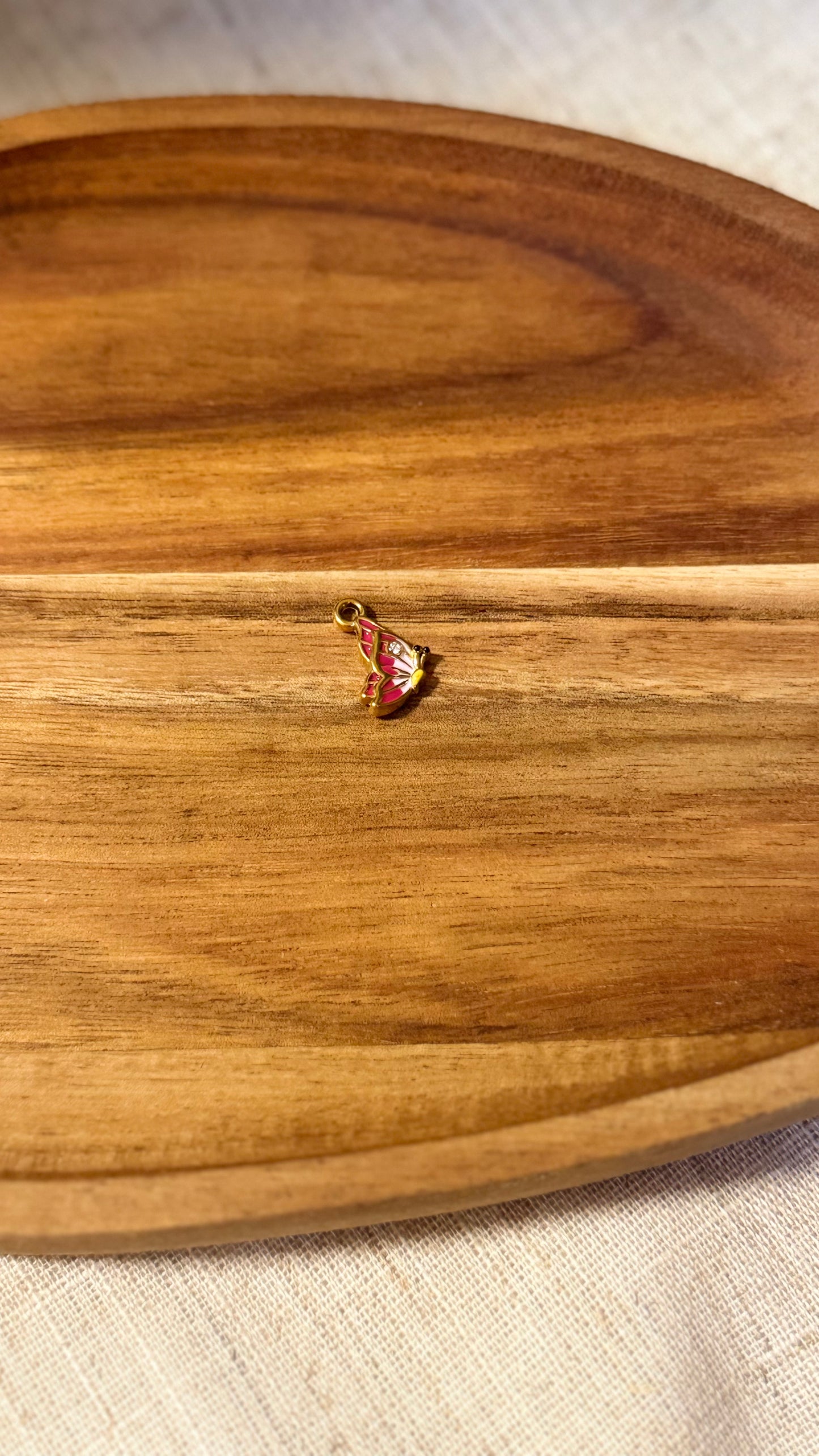 Charm papillon rose